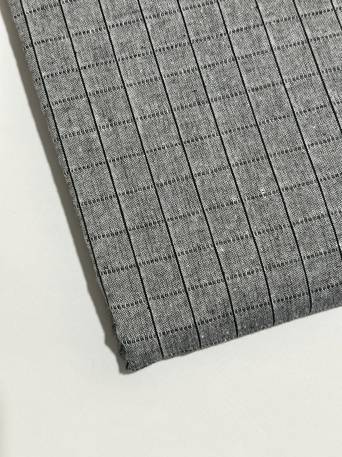 Light grey and black striped handmade winter wool fabric