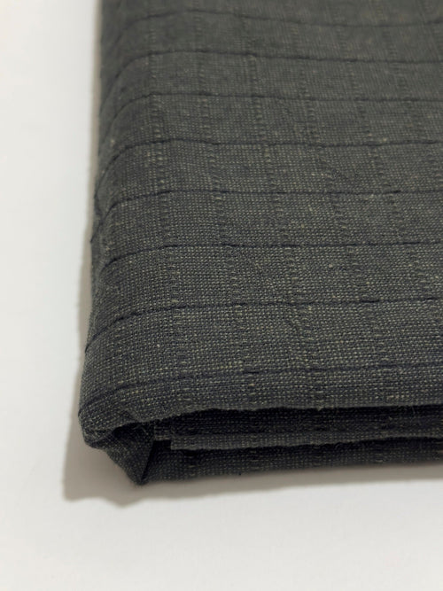 Charcoal black Dastoor winter wool fabric, folded detail