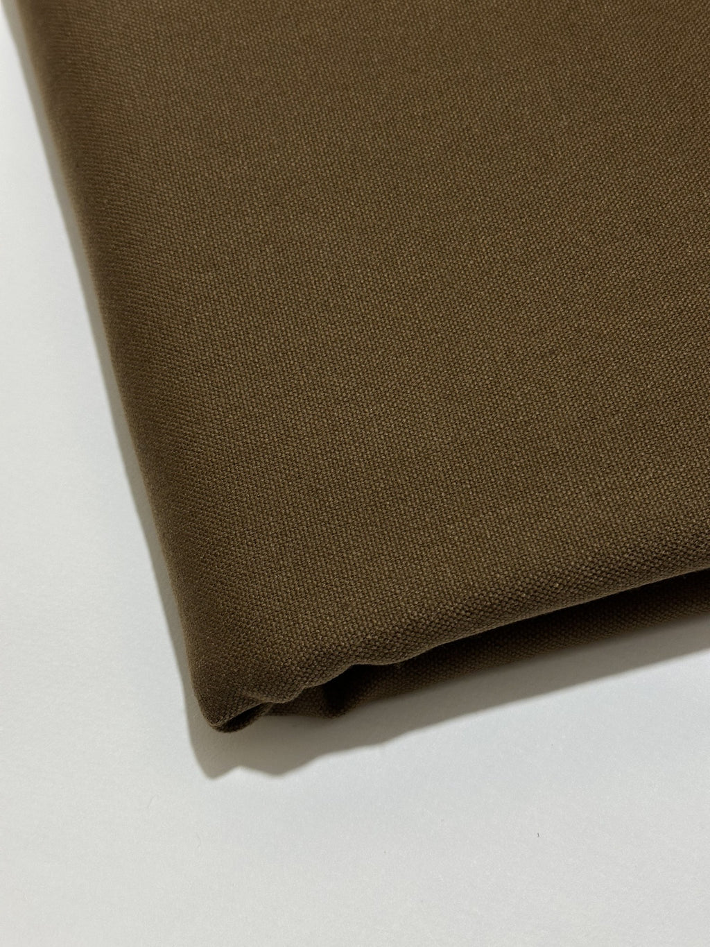 Walnut Brown Handmade Hamtaa wool fabric, folded close-up