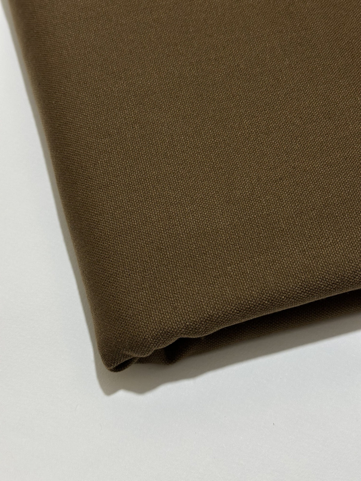 Walnut Brown Handmade Hamtaa wool fabric, folded close-up