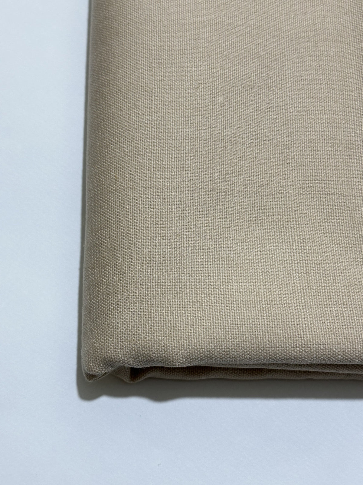 Warm Greige Handmade Hamtaa wool fabric, folded close-up