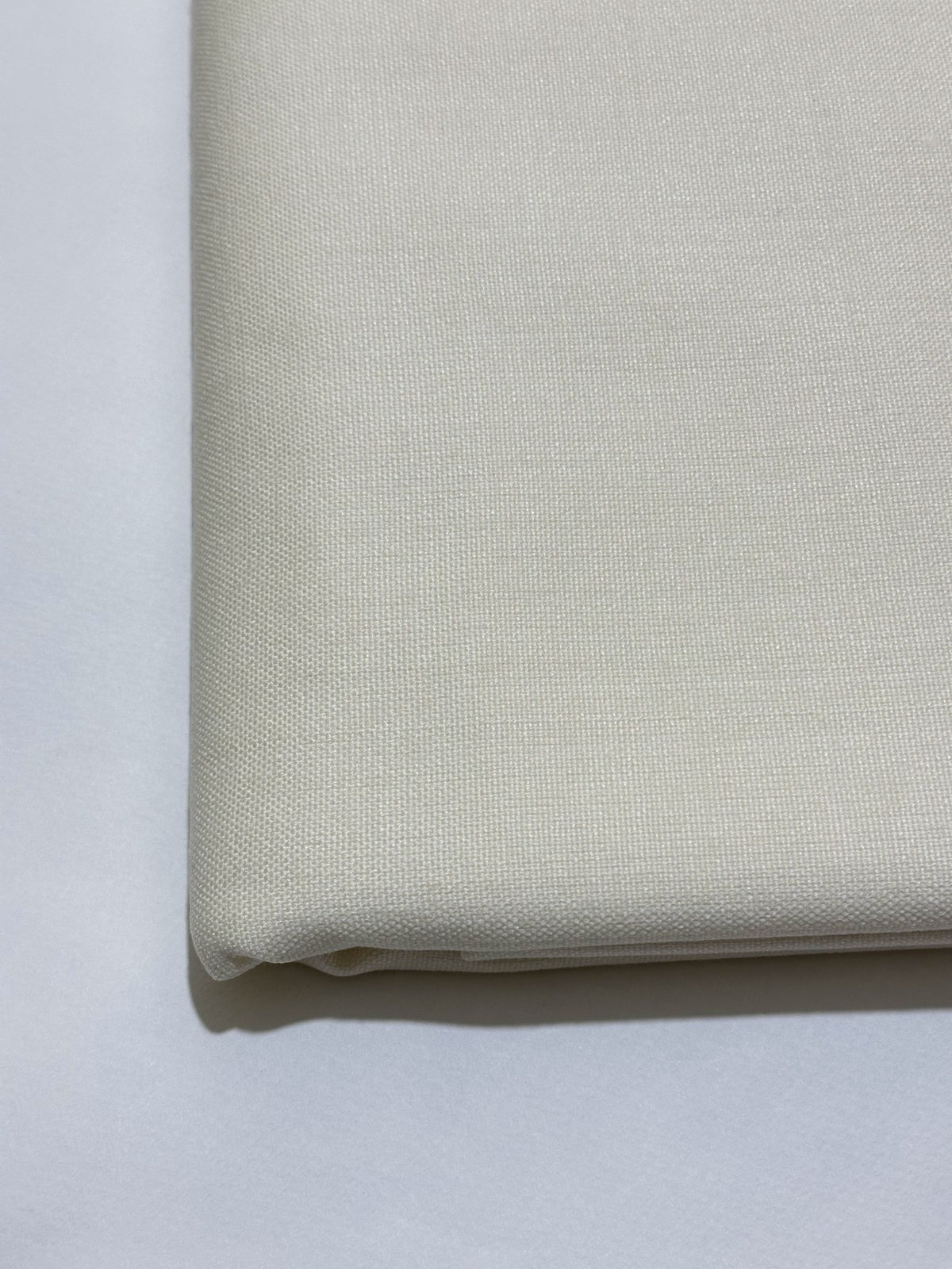 Off White Handmade Hamtaa wool fabric, folded close-up
