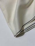 Off White Handmade Hamtaa wool fabric, black selvedge border detail