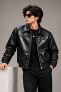 Men's Black Faux Leather Bomber Jacket – Elastic Hem worn by male model