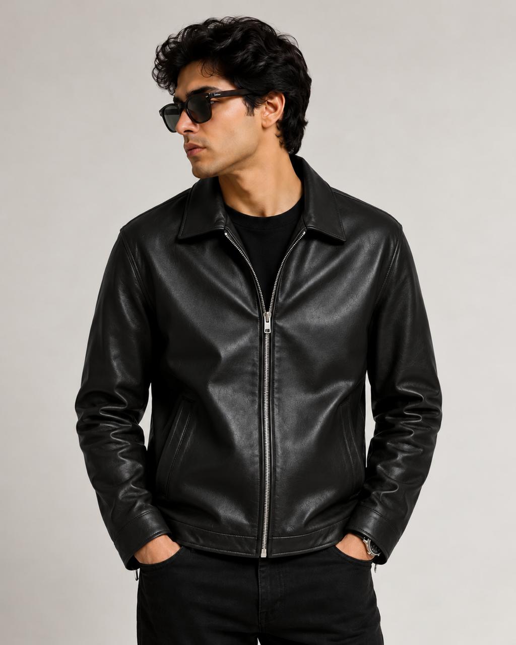 Male model wearing the black minimal faux leather jacket