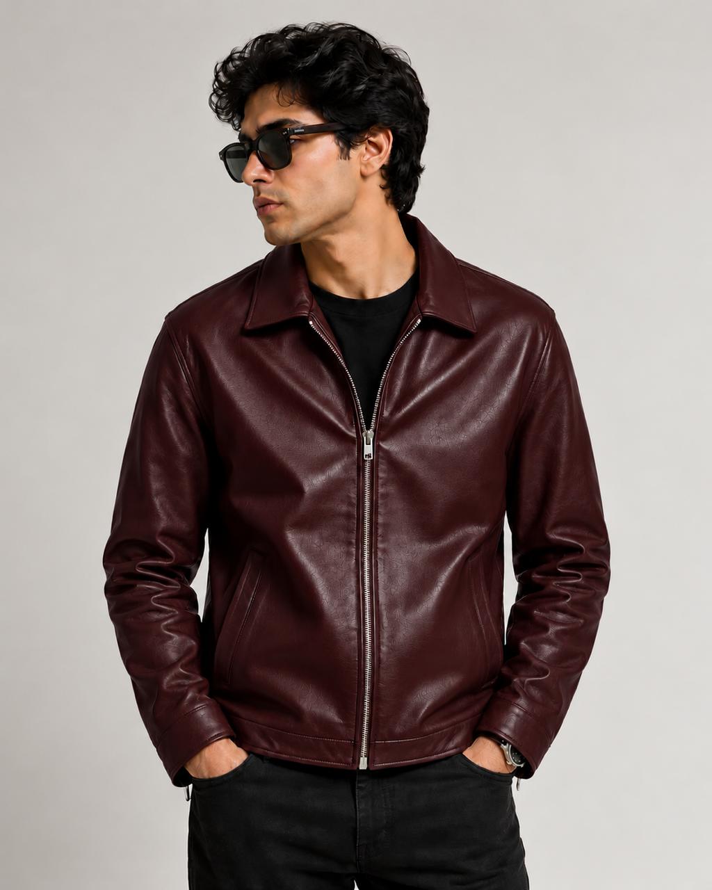 Male model wearing the burgundy minimal faux leather jacket