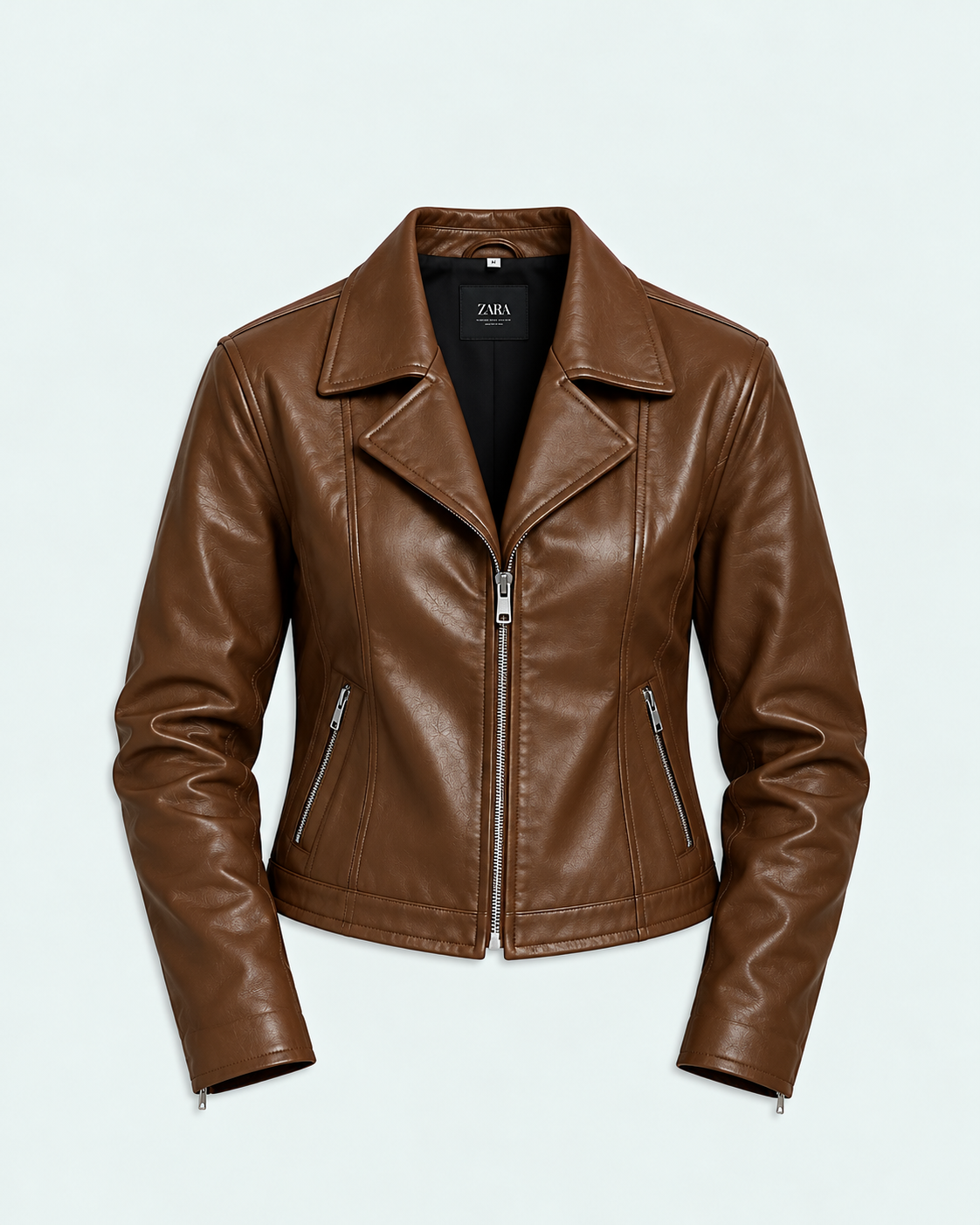 Women's brown faux leather biker jacket studio photo